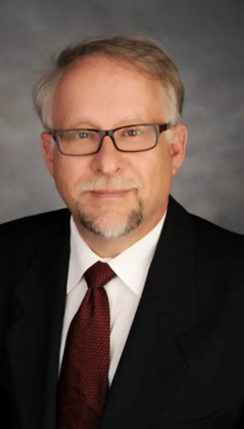 Dr. Roger K. Warren